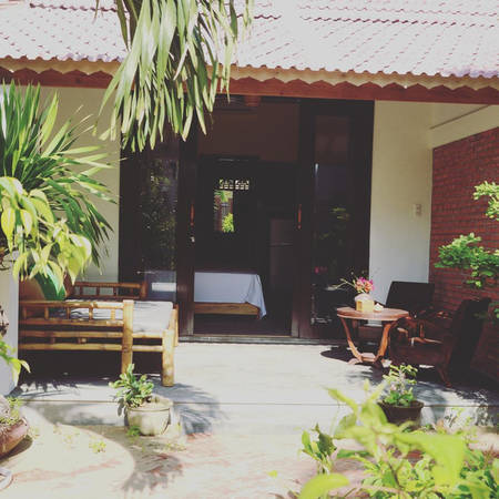 Phòng nghỉ homestay An Bàng Red Flower Cottage gần gũi thiên nhiên