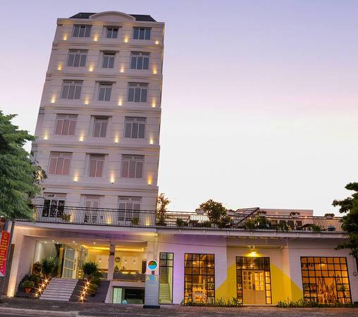Phòng ngủ ART Hotel Đà Nẵng tông xanh biển vàng