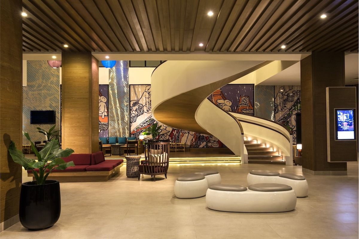 Phòng ngủ hiện đại view biển tại Citadines Bayfront