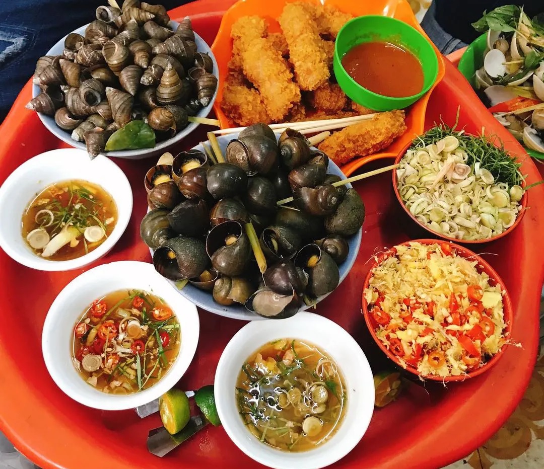 Văn hóa ăn ốc vỉa hè độc đáo Ốc xào bơ tỏi