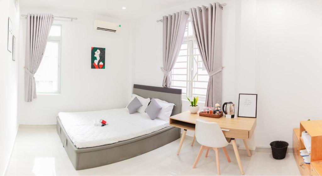 Phòng nghỉ ấm cúng Hello Saigon Homestay Phòng nghỉ ấm cúng Hello Saigon Homestay