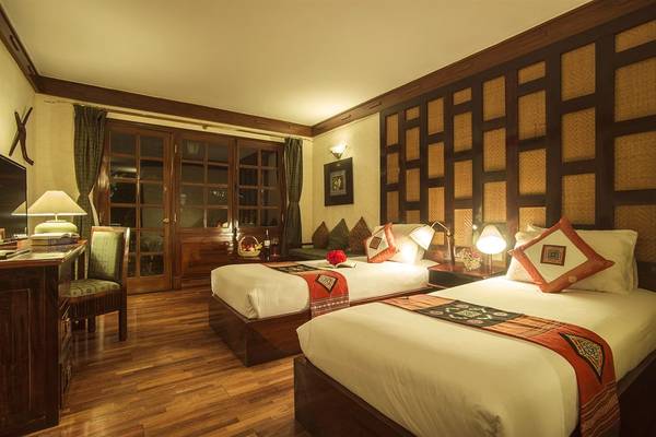 Phòng ngủ ấm áp tại Victoria Sapa Resort