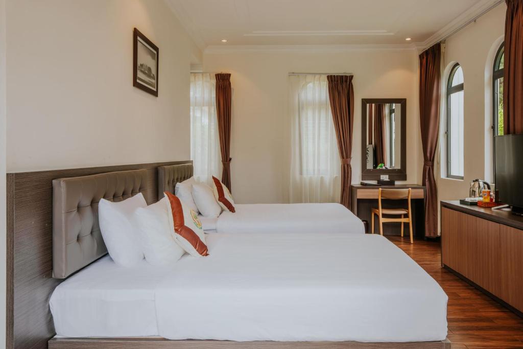 Sân vườn rộng tại Rừng Lá Kim Resort Đà Lạt Sân vườn rộng tại Rừng Lá Kim Resort Đà Lạt