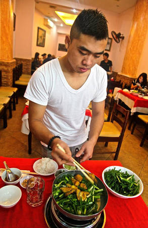 Chả cá là món ăn không thể bỏ qua trong chuyến du lịch Hà Nội