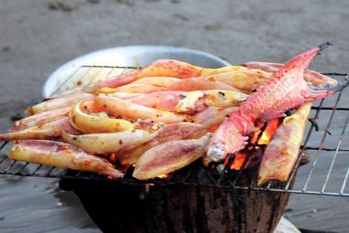 Mực nướng, món ăn nên thưởng thức khi đến với du lịch Hồ Tràm