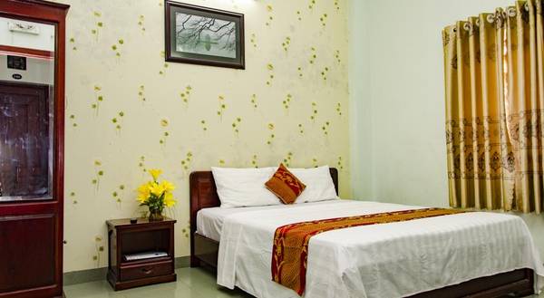Không gian phòng ngủ sạch sẽ tại khách sạn Bảo Long Nha Trang
