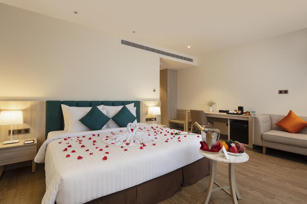 Phòng Deluxe khách sạn The Art Nest Nha Trang Nội thất tinh tế bên trong phòng ngủ khách sạn The Art Nest Nha Trang